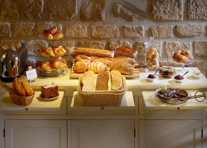 호텔 르 를레 몽마르트르 4*